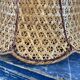 Vintage suspension in electrified braided wicker to nine