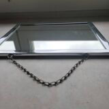Barber mirror with chain.