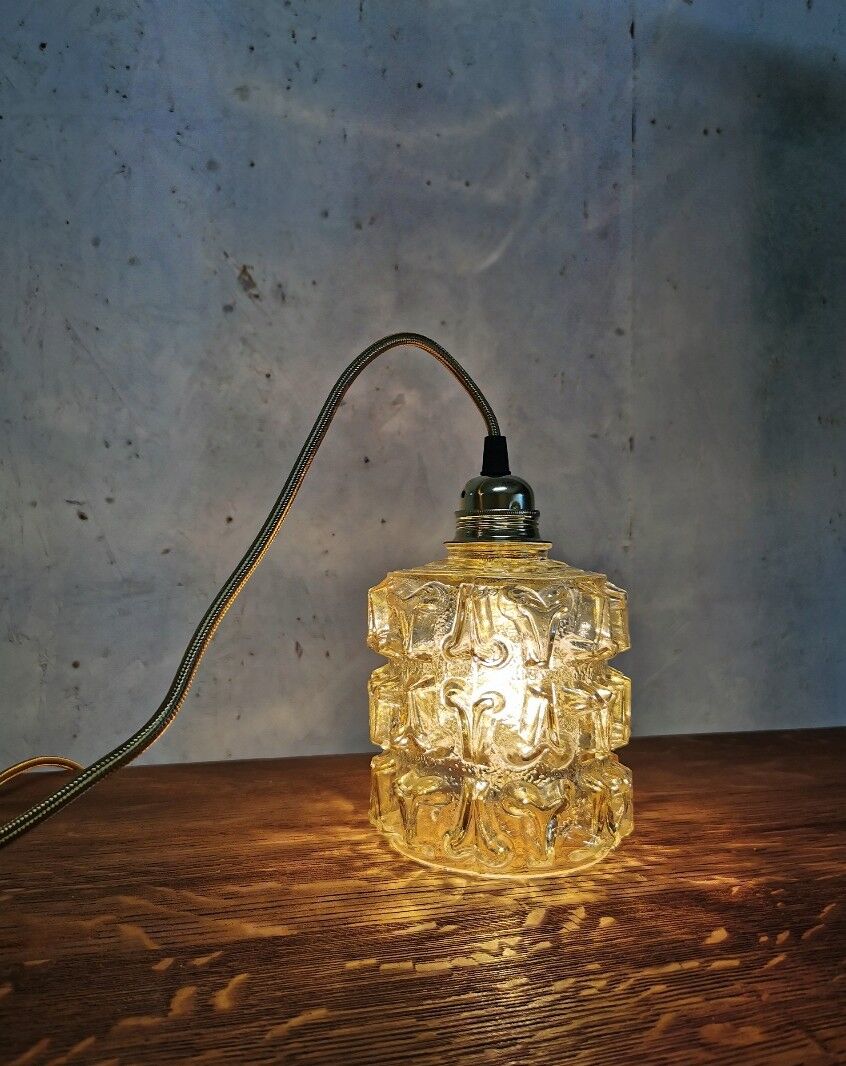 Old amber molded globe stroller