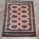 Tapis vintage noué main Bokhara Pakistan années 1950