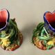 Pairs of vases decorated with majolica sarguemine flowers