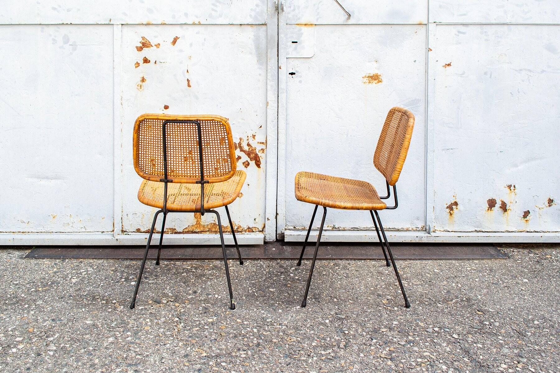 Dining chairs no. 550 in wicker by Dirk Van Sliedregt, Netherlands, 1950s, set of 2