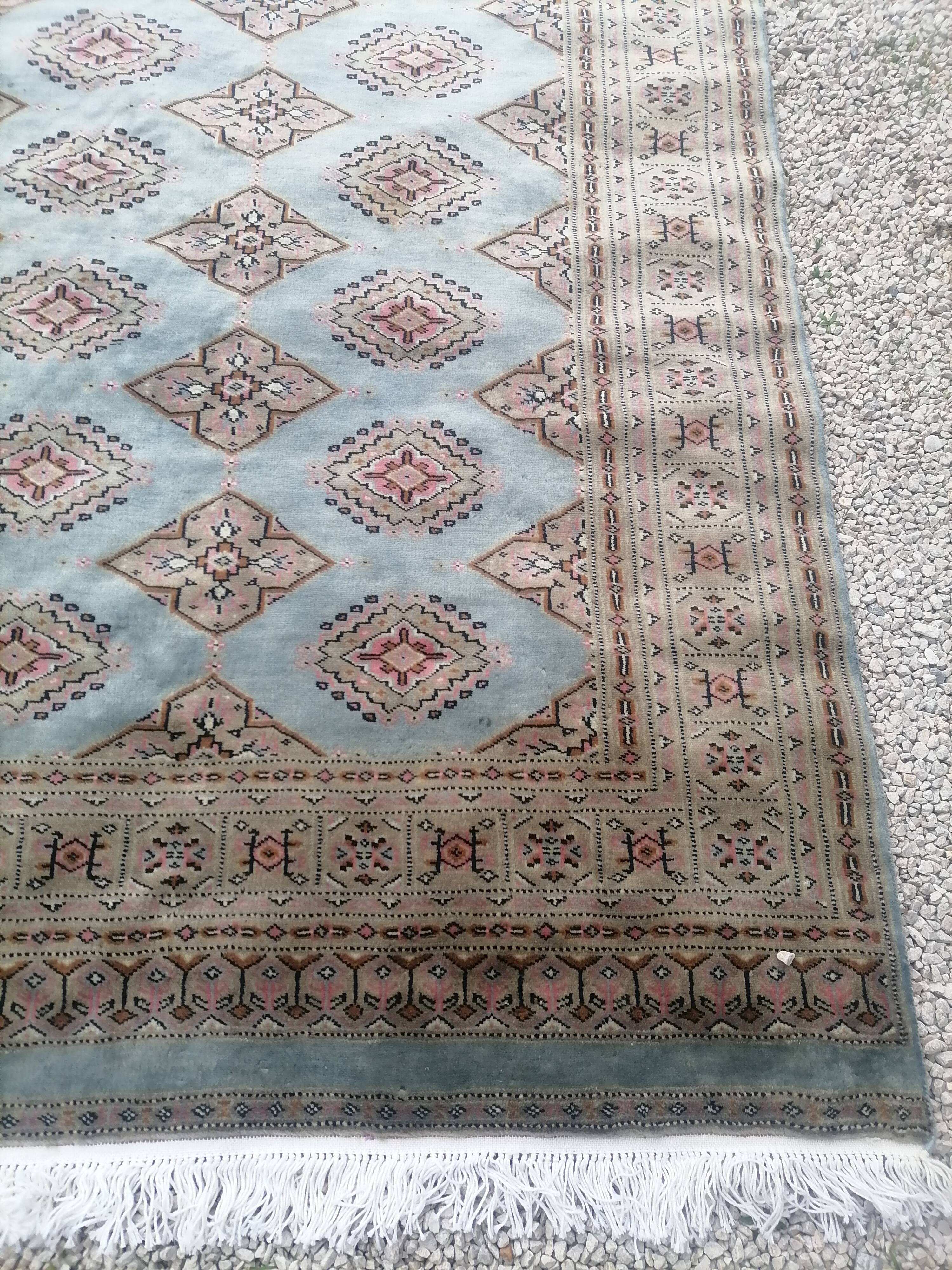 Old oriental carpet made hands. Signature. (175 x 125 )