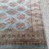 Old oriental carpet made hands. Signature. (175 x 125 )