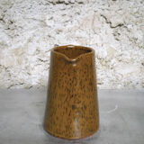 Milk pitcher in spotted sandstone