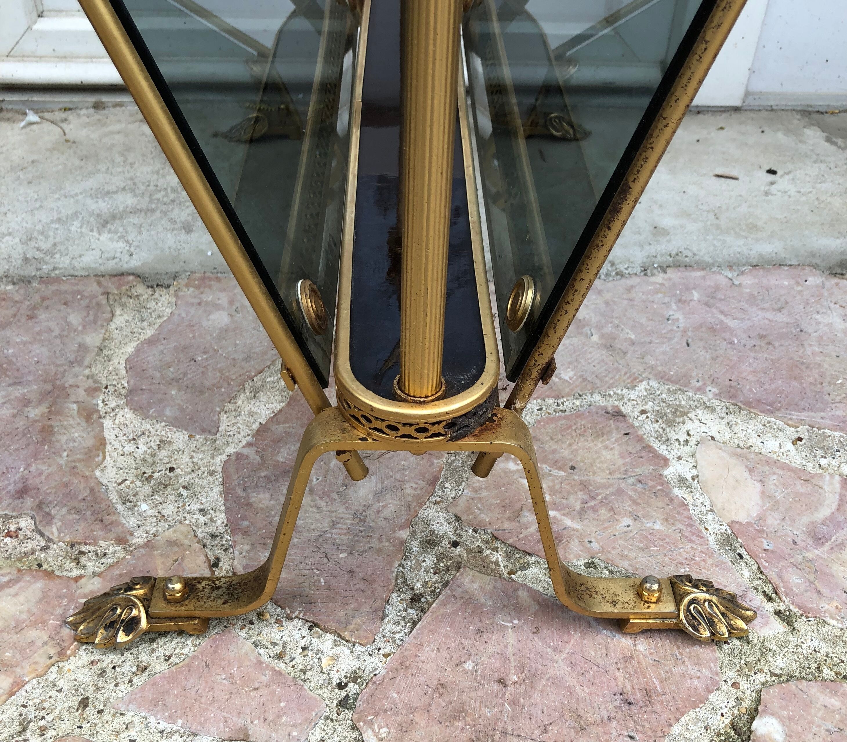 Revised door in brass and smoked glass