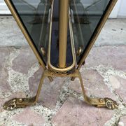 Revised door in brass and smoked glass