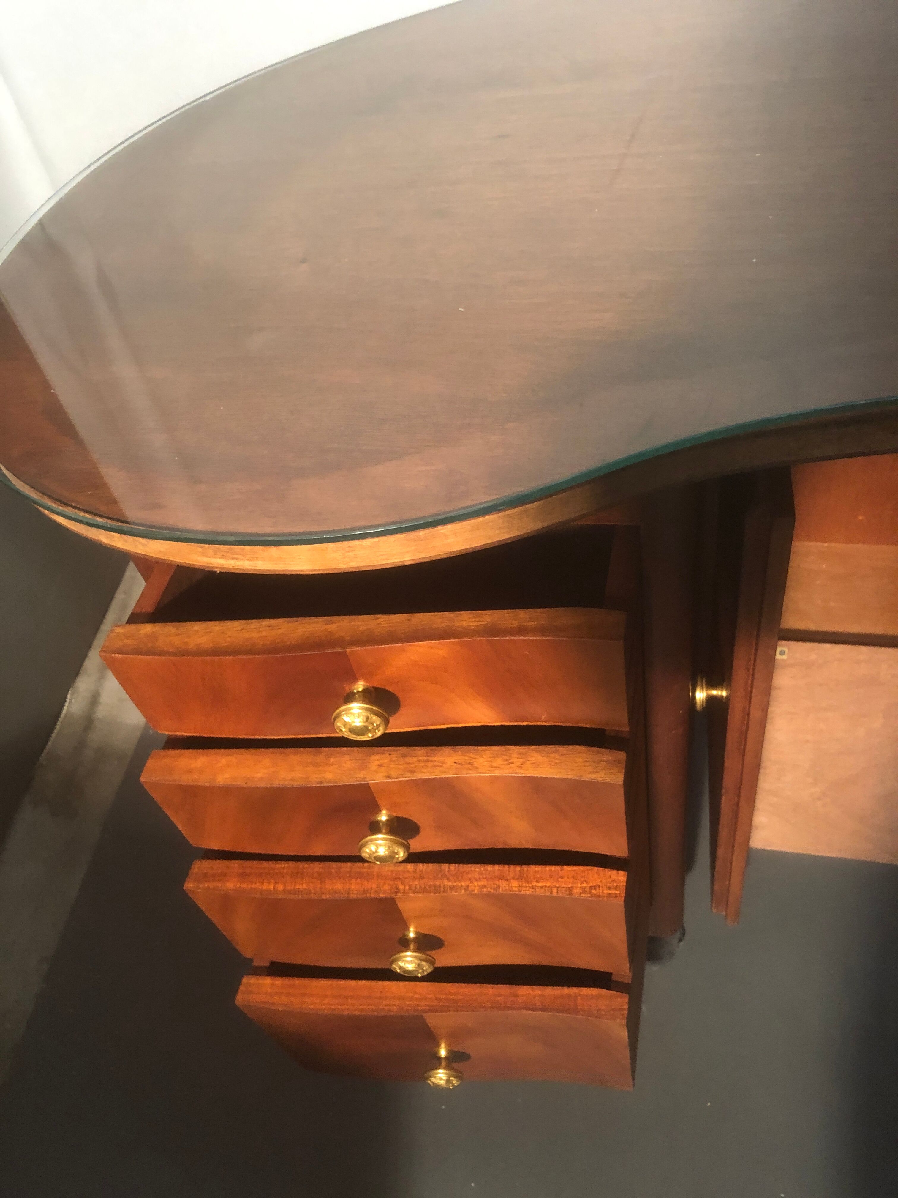 1940 desk in kidney shape with 8 drawers, 2 doors and footrest royere style
