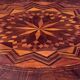 Round "Sorrentino" gueridon inlaid with a rosette design.