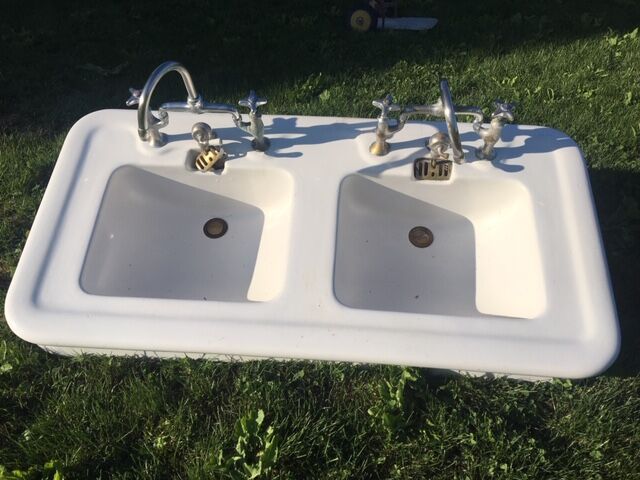 Old double sink with faucet