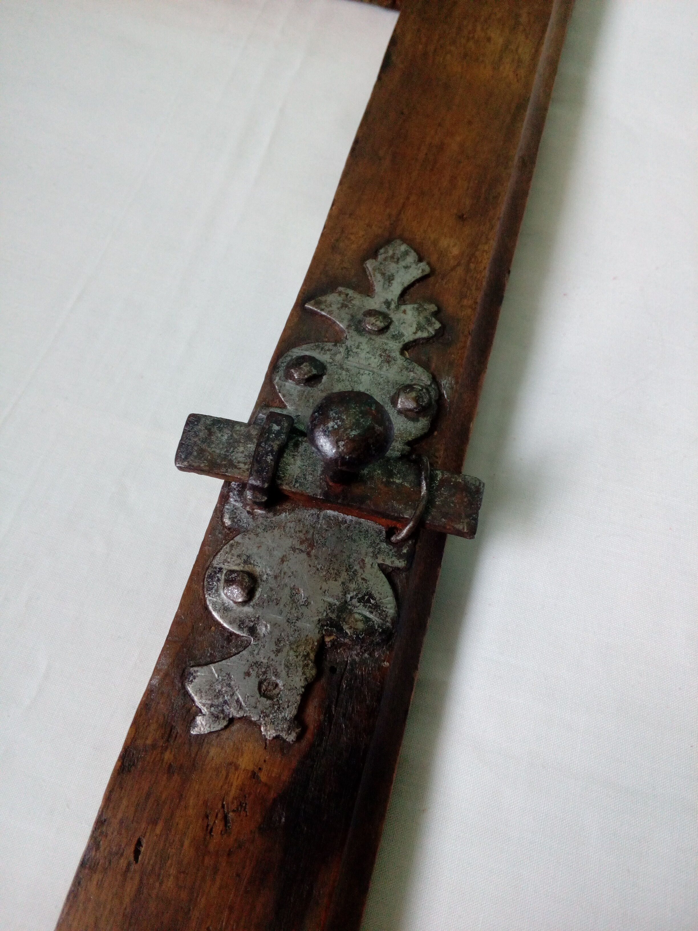 Wooden glass door with iron latch