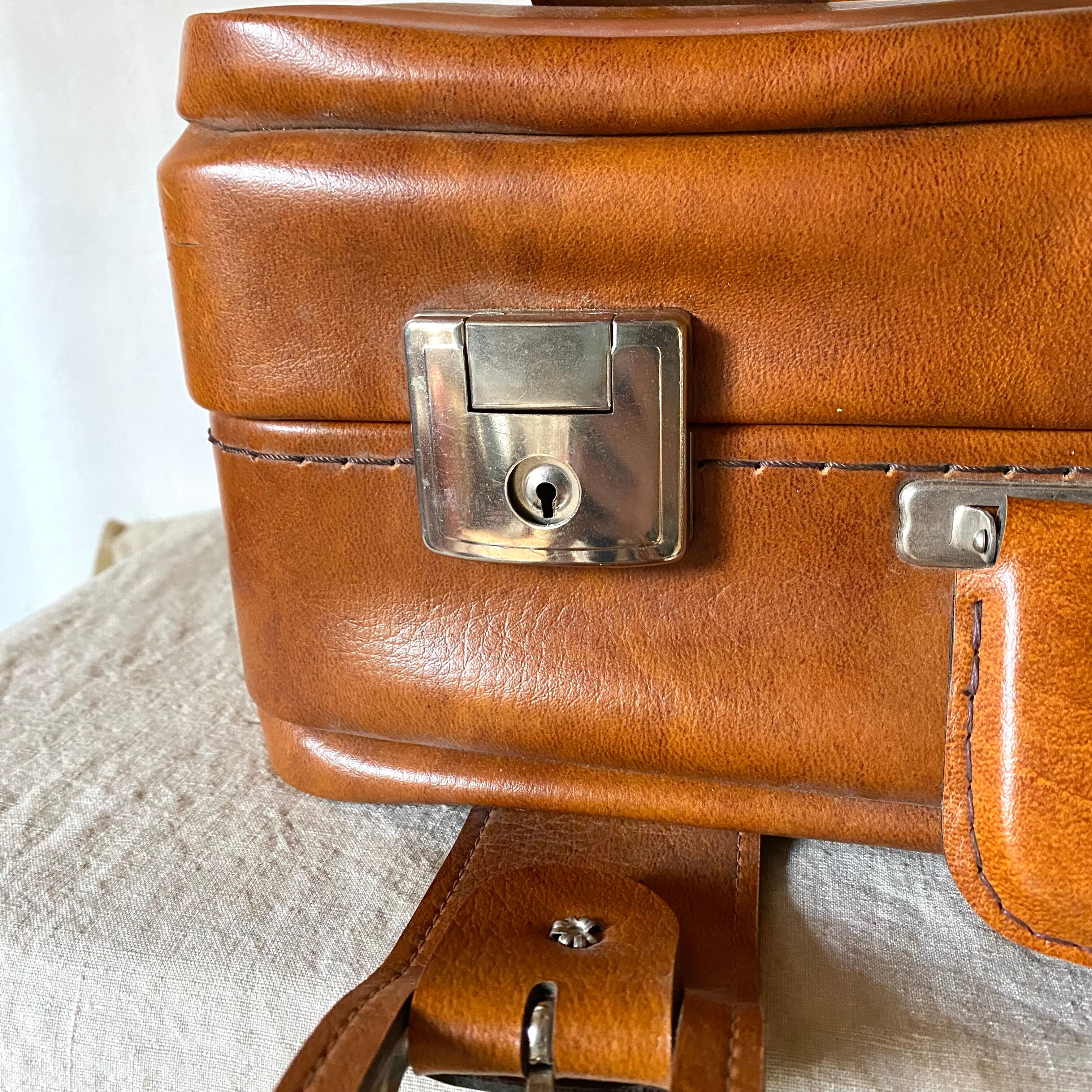 Vintage imitation leather suitcase