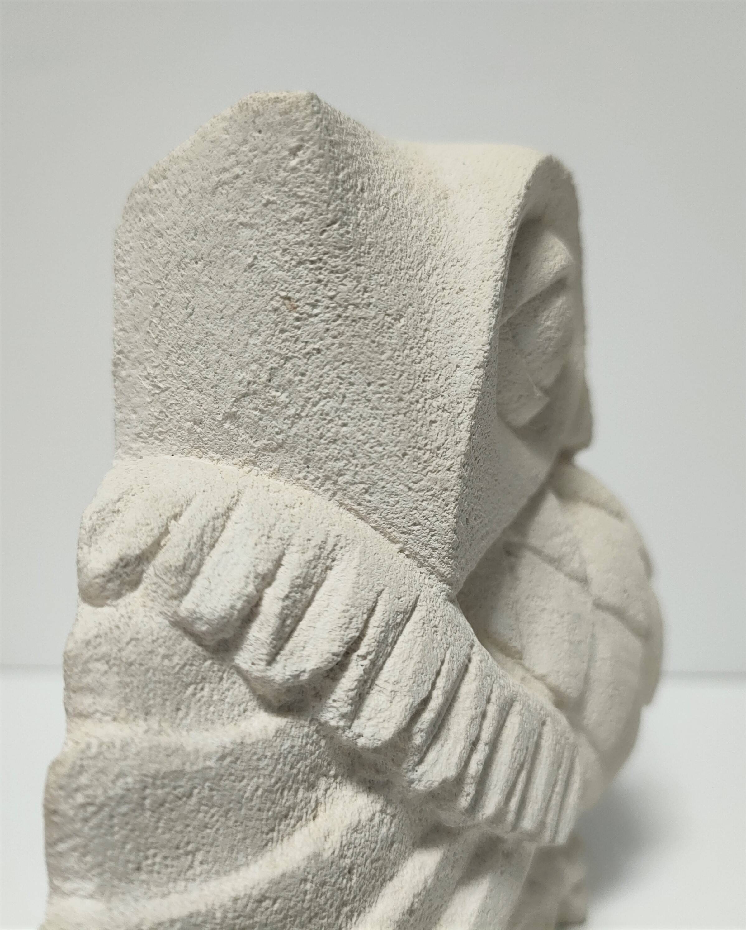 Signed stone owl sculpture