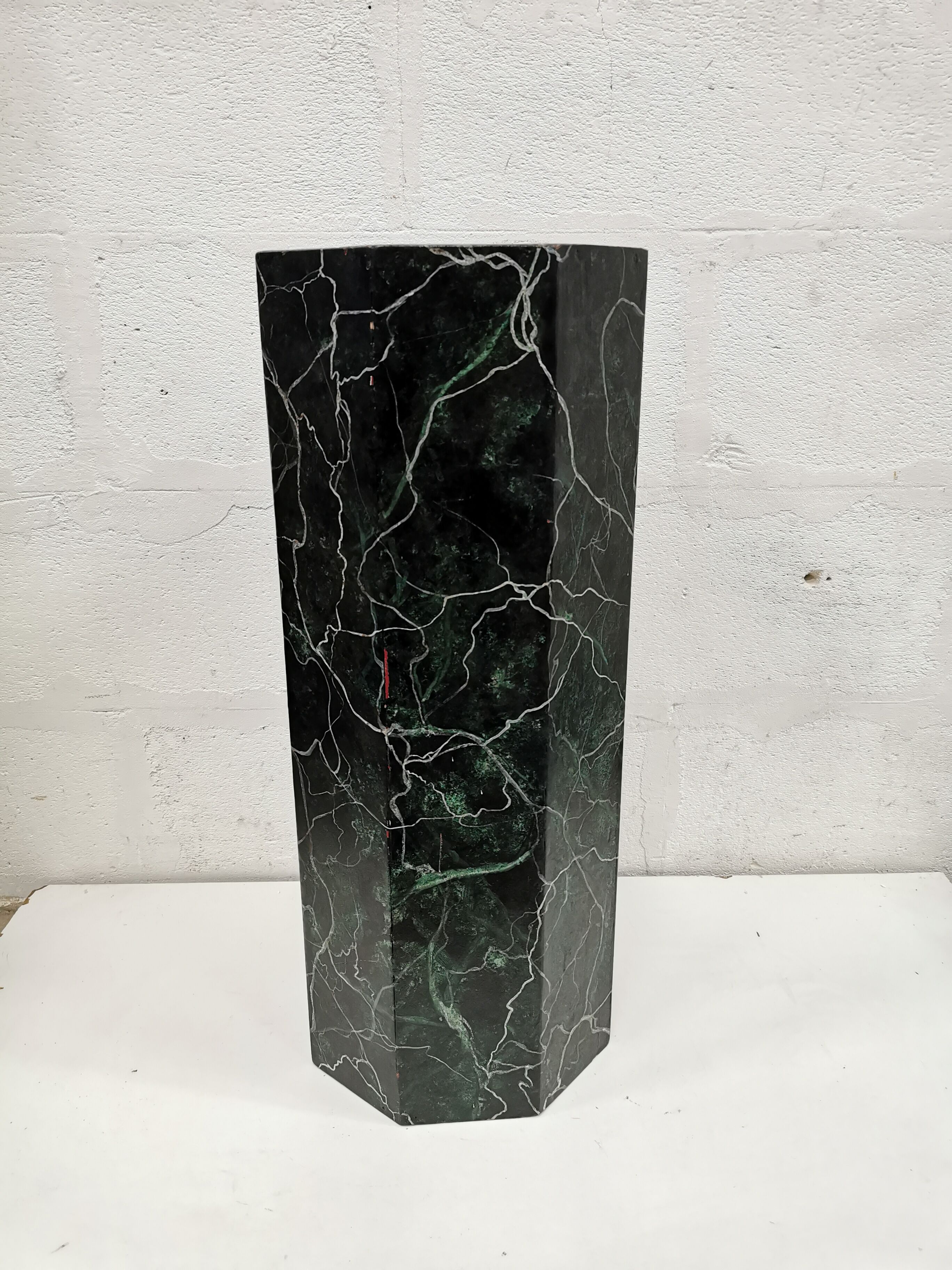 False marble pedestal