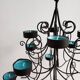 Black metal candlestick for 12 candles