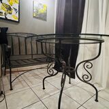 Table in wrought iron and glass, and matching two-seater bench