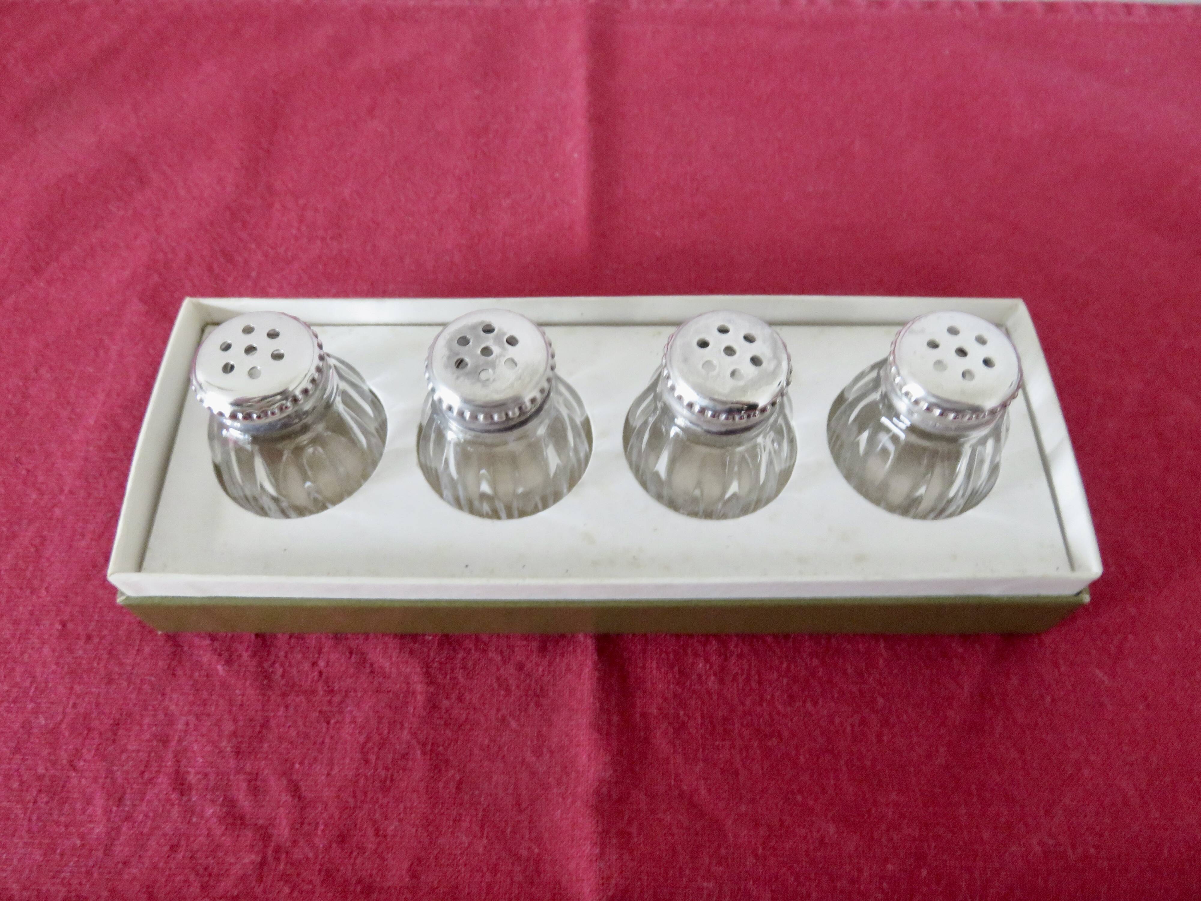 Salt and pepper "CHRISTOFLE" in solid silver in their original box, 1950.
