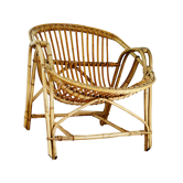 Fauteuil coquille des années 50 en rotin