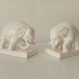 Paire de serre-livres anciens en céramique émaillée