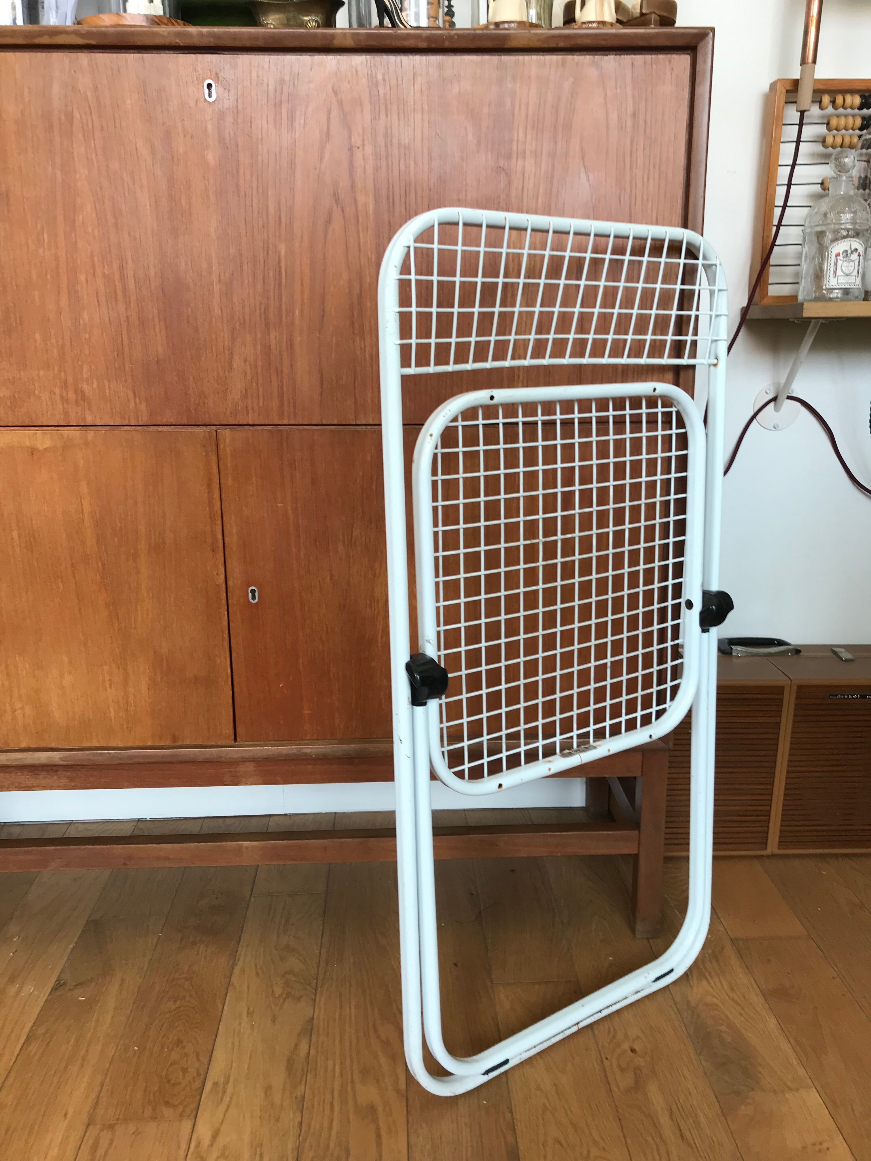 Metal folding chair by Talin Editions