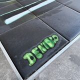 Mid-century Denisco ceramic coffee table — black, blue and white glazed tile top with silver metal base