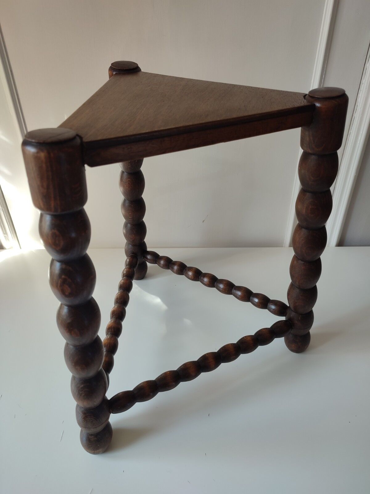 Wood tripod sofa end