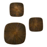 Set of three bronze mats