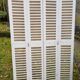 Pair of old shutters with louvers