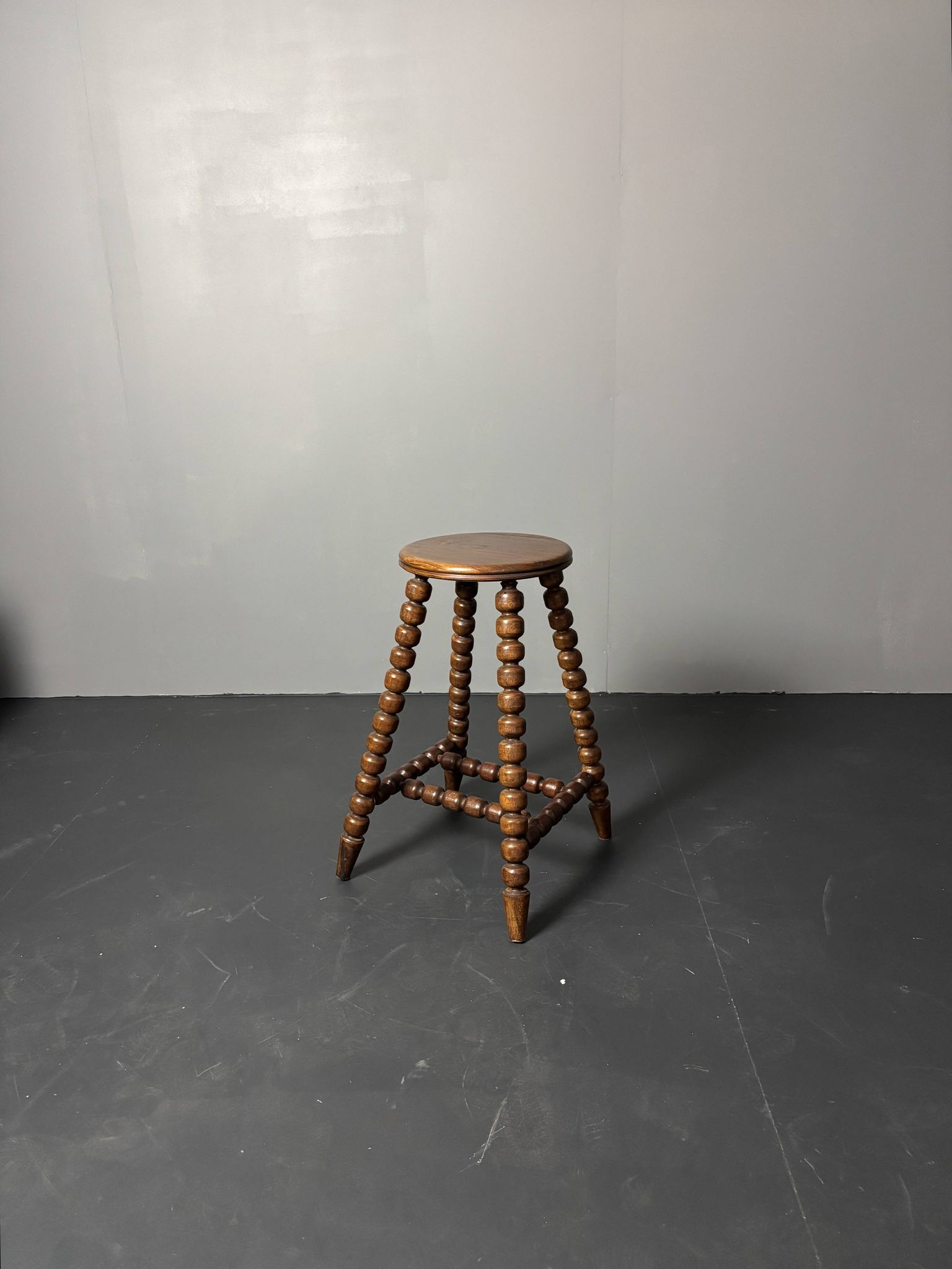 Midcentury brutalist wood turned stool in the style of Charles Dudouyt, 50s