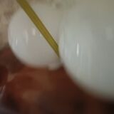 Pair of spherical lampshades in opaline.