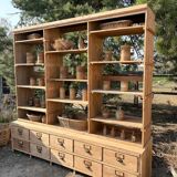 Large antique workshop furniture with drawers and shelves.