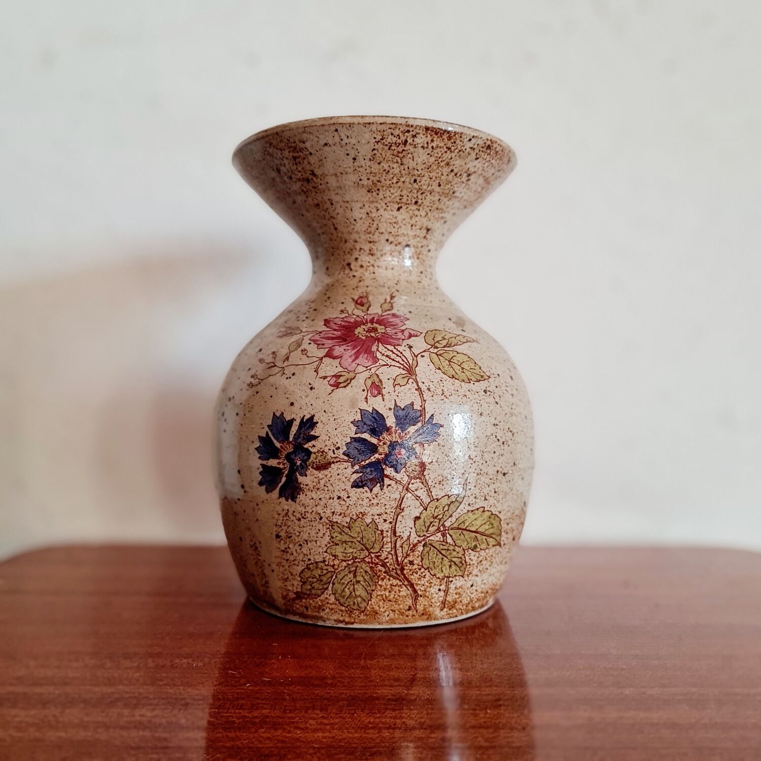 Old sandstone vase painted flowers