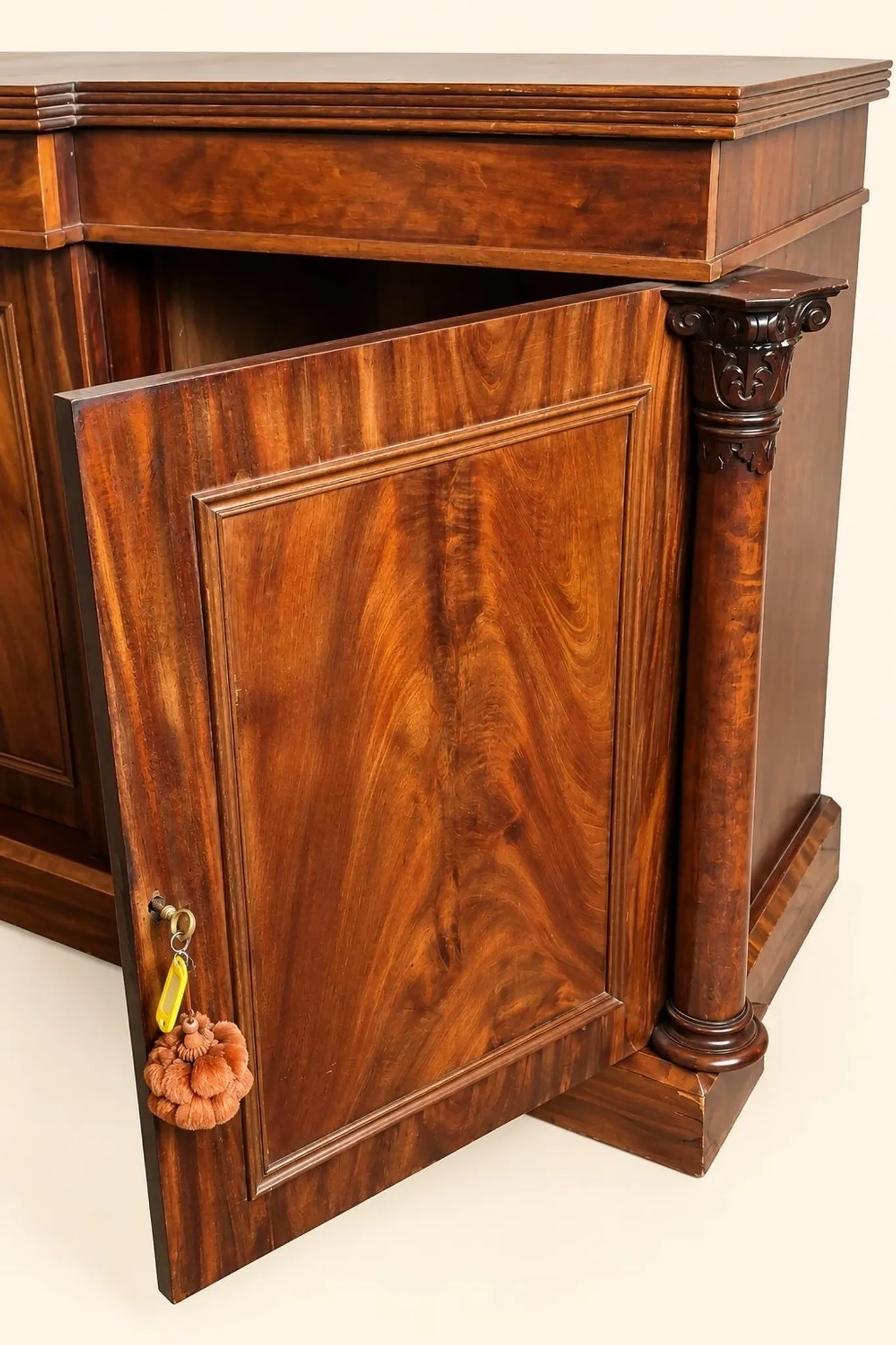 Large buffet in flame mahogany, William IV / Regency columns.