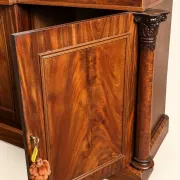 Large buffet in flame mahogany, William IV / Regency columns.