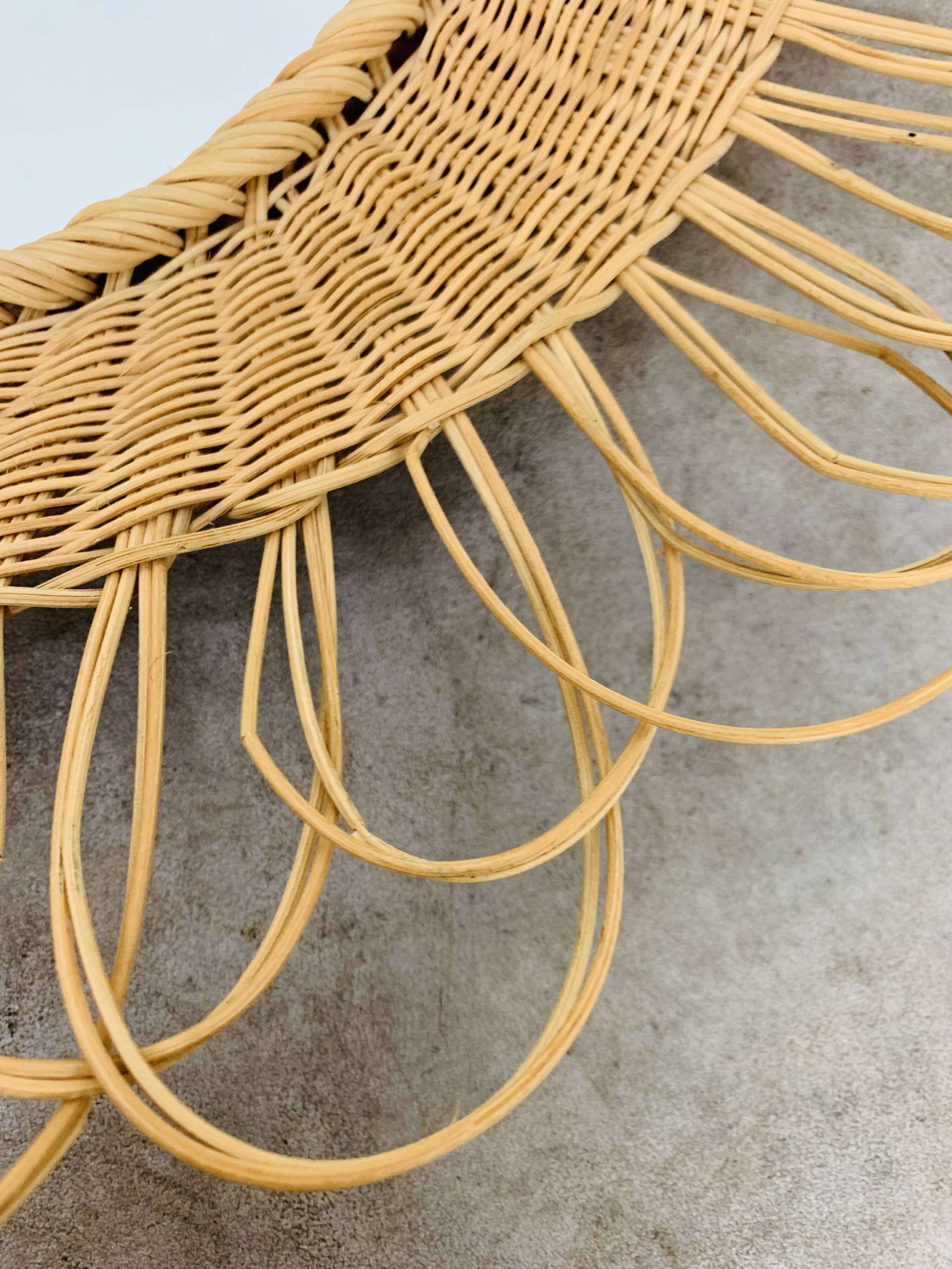 Vintage rattan sun mirror from the 60s