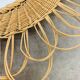 Vintage rattan sun mirror from the 60s