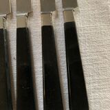 Batch of black cheese knives