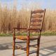 Set of 4 rustic vintage armchairs in English farmhouse style with rush seats.