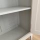 Vintage Parisian wardrobe painted in linen white, one door, three shelves