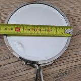 Mirror "face to hand" in chromed metal