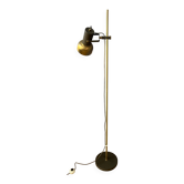 Vintage brass floor lamp with adjustable spotlight.