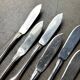 6 Christofle fish knives in silver-plated metal, shell design.