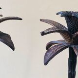 Pair of patinated metal candlesticks