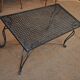 Table basse metal perforé pied fer forgé 1940