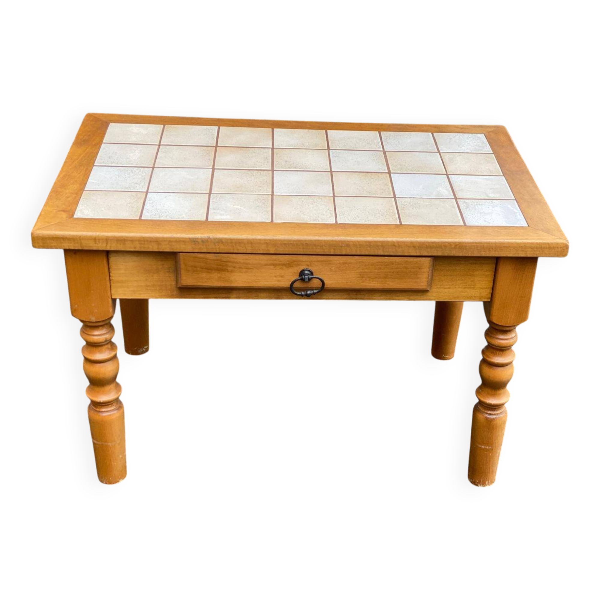Light solid wood coffee table with tiles and a drawer.