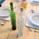 Pair of vintage ribbed blown glass bottles with cork stoppers.