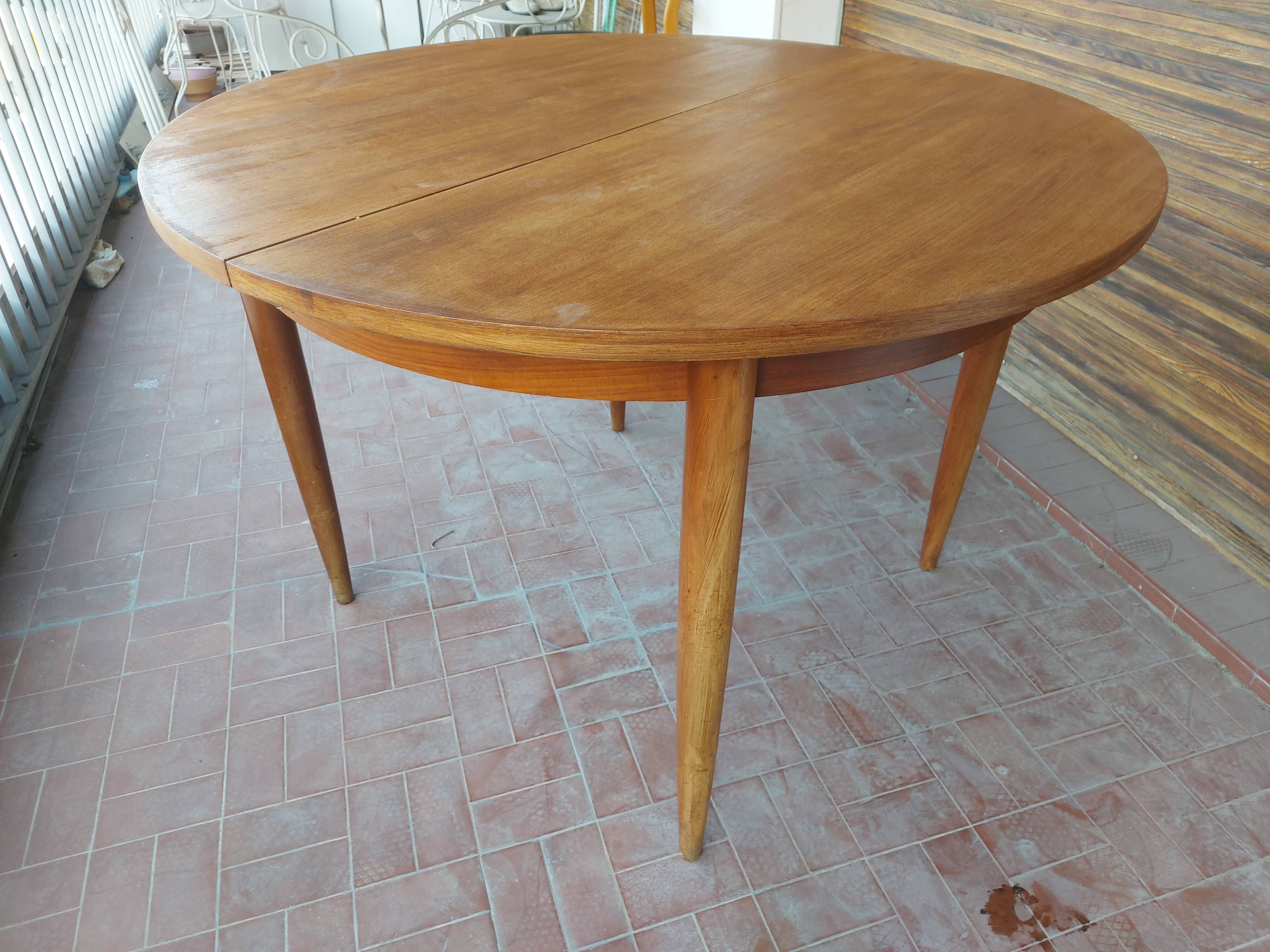 Scandinavian design teak table with extension cord