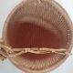 Rattan basket to hang vintage plant door