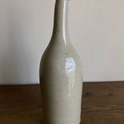 Bouteille de grès penchée début 20e