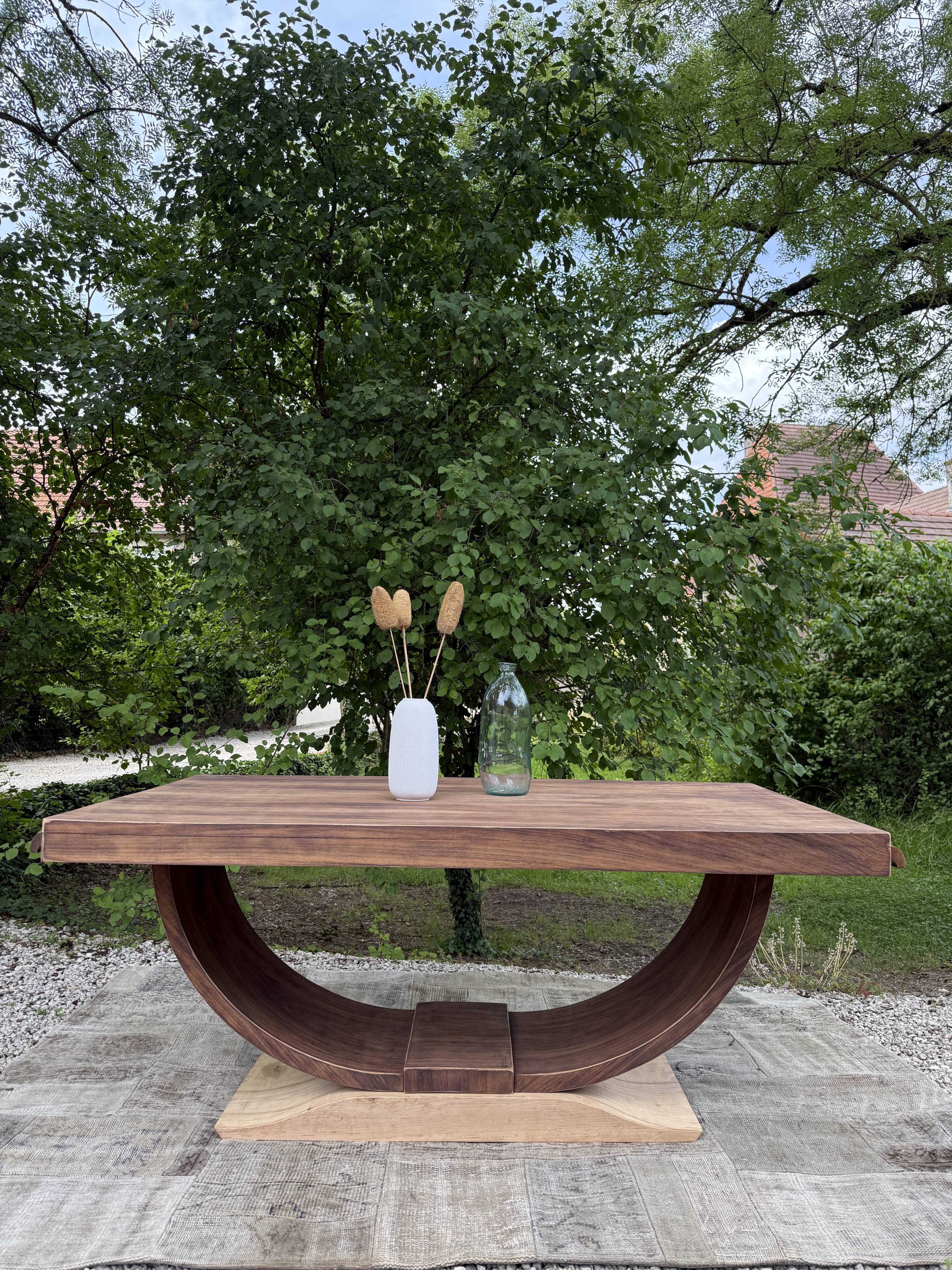 Renovated wooden table with extensions.